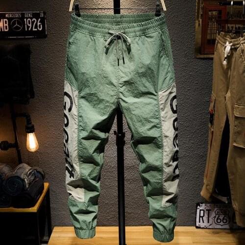 Sports pants mens summer casual pants mens loose harem pants mens nine-point beam pants mens quick-drying pants tide