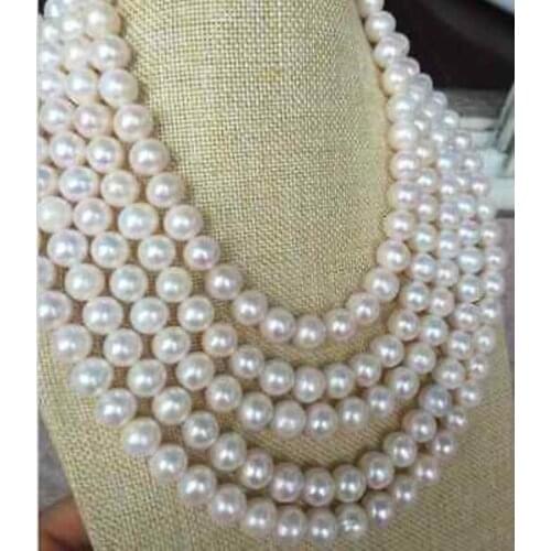 Beautiful 100" 10-11mm round white pearl necklace