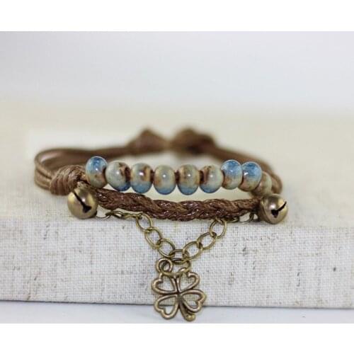 Clover Leaf Charm Bracelets Ceramic Blue Green Beads For Women/Men Jewerly Bell Bracelet Weave Rope Chains Wristbands Accessory