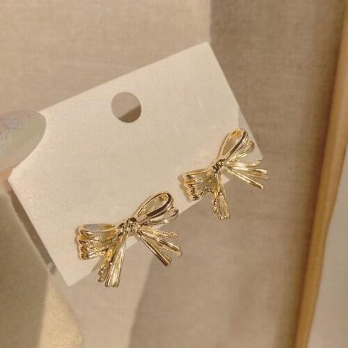 High-grade metal earrings Korea cold wind niche bow earrings female net celebrity fashion temperament simple earrings