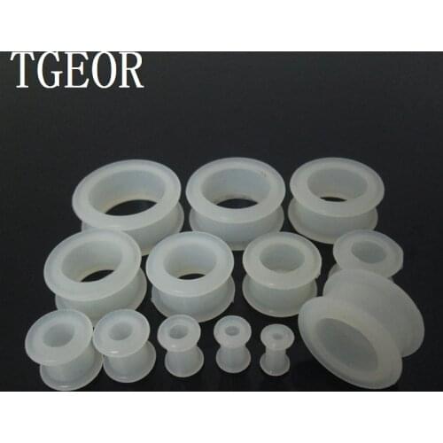 Hot Selling 12pcs mixed 12 gauges round shape silicone glow in the dark clear white flexible hollow ear tunnels free shipping