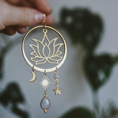 Moonstone lotus. a pair of bohemian celestial lotus flower and rainbow moonstone chandelier hoop statement earrings