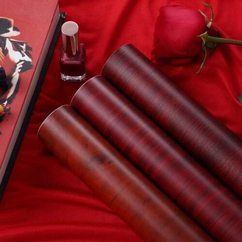 Wood grain sticker waterproof furniture cabinet table top door red self-adhesive wallpaper peeled and glued kitchen PVC vinyl