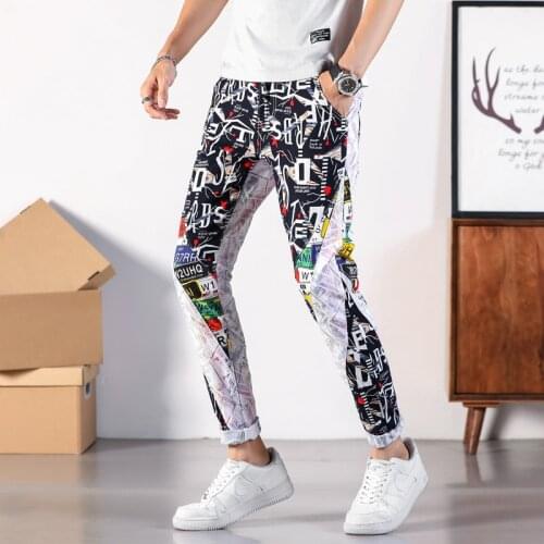 Mens Dollar Letters Printed Patchwork White Jeans Fashion Graffiti Colored Painted Slim Straight Denim Pants