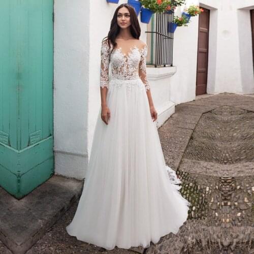 Ivory A-line Wedding Dresses 3/4 Sleeve Top Lace Applique Tulle Bridal Gowns Sweep Train Beach Boho Floor Lenth Vestido De Novia
