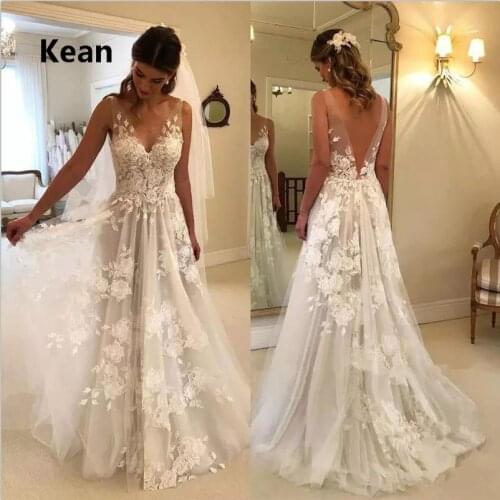 Spaghetti Straps Wedding Dress V-Neck Applique Backless Vestido De Noiva Dubai Arabic Wedding Gown Bride Dress Robe De Mariee