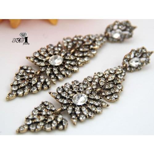 YaYi Jewelry Fashion BOHO White Glass Crystal Rhinestone Dangle Women Ancient Gold Color Wear Ear Band Long Tassel Earrings