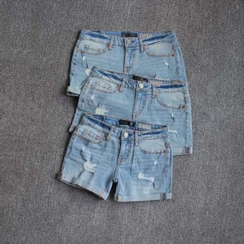 Summer women fashion low waist water wash ripped hem rolled up casual denim shorts