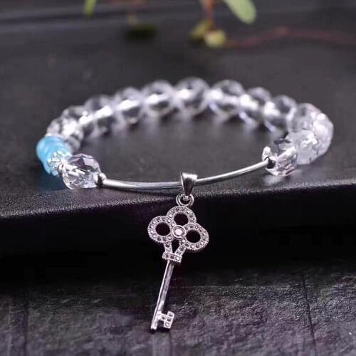 Light-up natural white crystal faceted single ring silver key pendant