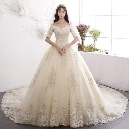 Beautiful Lace Fabric Wedding Dress 2021 With Train Boat Neck New Half Sleeves Sparkly Women Ball Gown Vestidos Robe De Mariée