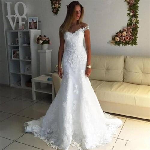 Romantic White Appliqued Off Shoulders Mermaid Wedding Dresses Cheap 2021 New Backless Bridal Gowns robe De Marriage