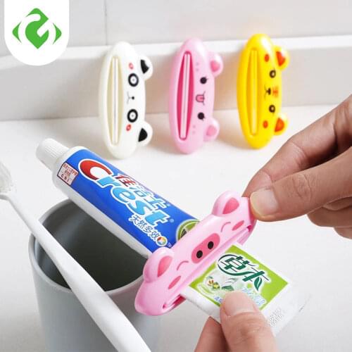 1PCS Cartoon Toothpaste Dispenser Clip-on Tube Squeezer Home Tube Squeezer Easy Tooth Paste Rolling Holder Bathroom Accessories