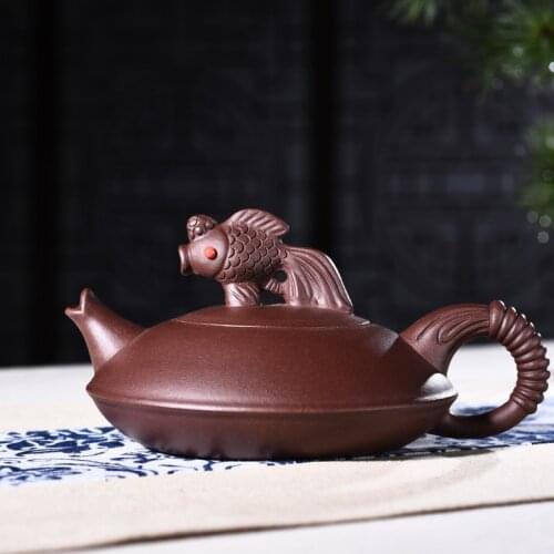 Yixing teapot genuine all handmade raw ore purple mud fish jump teapot Kung Fu Zisha teapot tea set