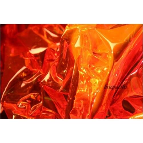 Bright orange illusion laser fluorescent clothing waterproof imitation leather wedding fabric