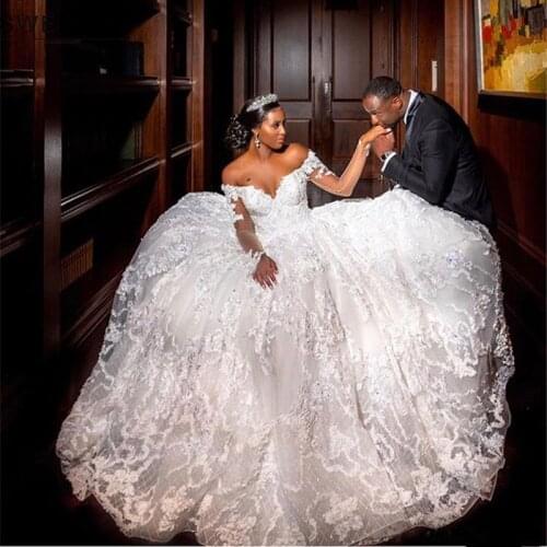Luxury Lace Ball Gown Wedding Dresses With Train Sexy Lace Up Back Long Sleeve Bride Dress African Wedding Gowns