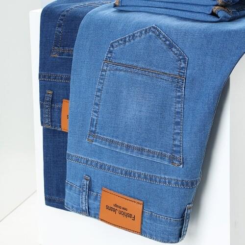 Plus Size 42 Men Jeans Spring Summer Thin Casual Business Fashion Light Blue Stretch Denim Trousers Male Brand Apparel
