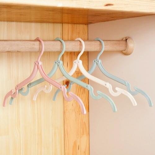 Free Shipping 1Pcs Mini House Keeping Folding Hanger Stylish Clothing Coat Hanger Magic Portable Folding Drying Rack for Travel