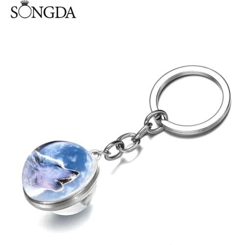 Glow in the Dark Wolf Key Chain Howling Animal and Moon Keyring Pendant Double Sided Glowing Glass Ball Wolfs Head Keychain
