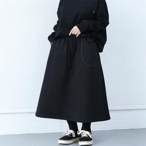 2021 spring and autumn new large size design loose skirt womens black high waist a-word medium and long style with small arms