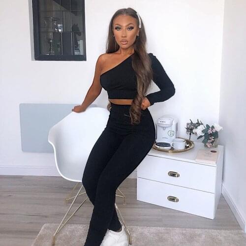 European and American fashion casual womens wear with one shoulder long sleeve short jacket elastic tight hip trousers two suit