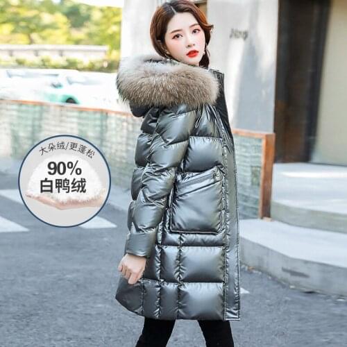 Down jacket female in long winter in 2020, the new 90% white duck down collars loose fashion really shiny coat