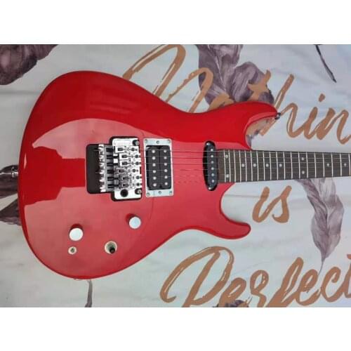 Red six string retro electric guitar. We can customize any style of electric guitar and electric bass