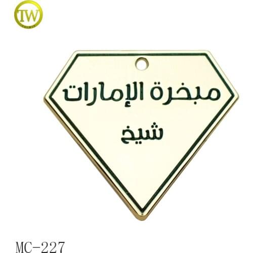 Eco-Friendly nickel lead free holes sewing logo custom metal clothing labels