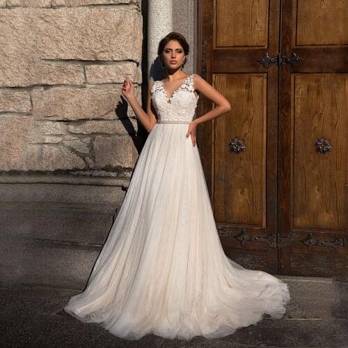 Popular A Line V Neck Lace Vintage Wedding Dresses Sleeveless Floor Length Beach Beading Sashes White Bridal Gowns