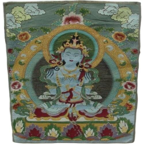 A golden silk embroidery thangka Tibet and Nepal exorcism peace and wealth