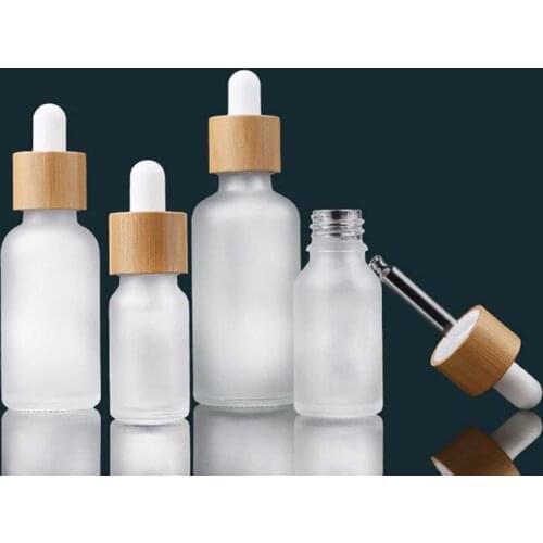 New 5ml 10ml 15ml 20ml 30ml 50ml oil bottle with bamboo essence in frosted glass 1000pcs wholesale