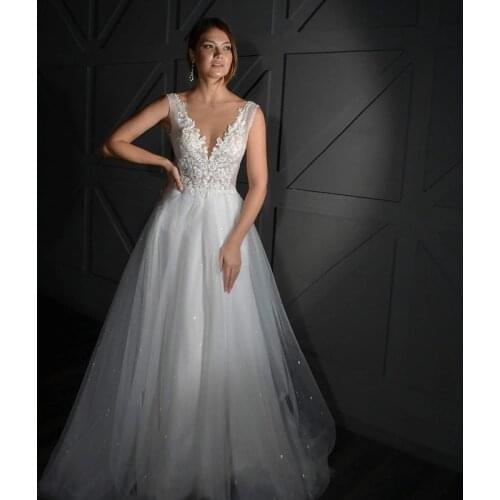 Deep V Neck Tulle Wedding Dresses A Line Open Back Appliqued Floor Length Sweep Train Sleeveless Bridal Dress Vestido De Noiva