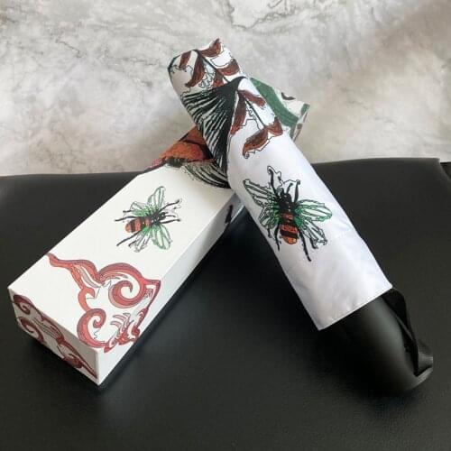 New Trendy Brand Automatic Three-fold Folding Umbrella Black Glue Coated Sun Umbrella Anti-UV Umbrella Rain or Rain Umbrella