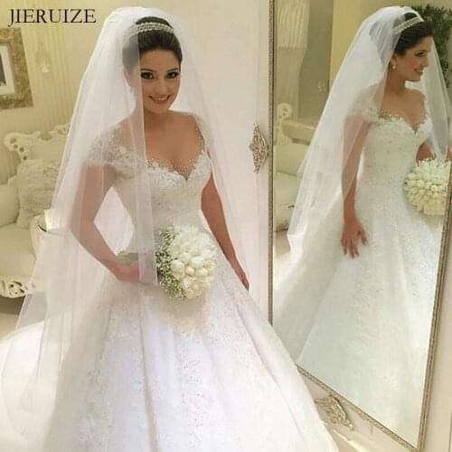 JIERUIZE White Lace Appliques Crystals Ball Gown Wedding Dresses Cap Sleeves Lace Up Back Bride Dresses Wedding Gowns