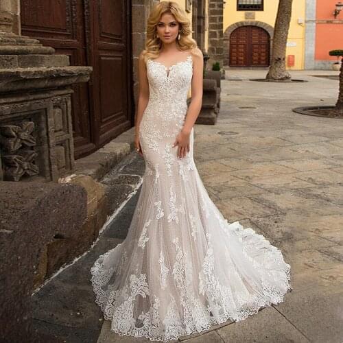 Elegant Lace Mermaid Wedding Dress 2021 Sexy Sheer Scoop Neck Appliques Sweep Train Sleeveless Bridal Gowns