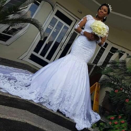 2021 Illusion Long Sleeves African Wedding Dresses Mermaid Lace Applique Wedding Gowns vestidos de novia Beaded Bridal Dresses