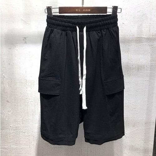 Mens summer dark loose sports shorts. Fashion trend. Low waist cotton and linen shorts