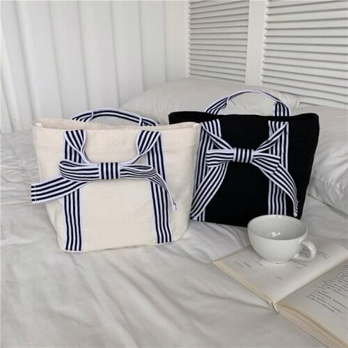 Stylish Simple Design Bow-tie Canvas Bag for Women‘s Elegant and Cool Top-Handbag Trapeze 2021 New Trendy Luxury Bags