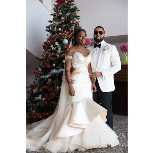 Strapless Mermaid Wedding Dresses Sleeveless Sexy Backless Sequins Beaded Pleated Tiered Floor Length Bridal Gowns