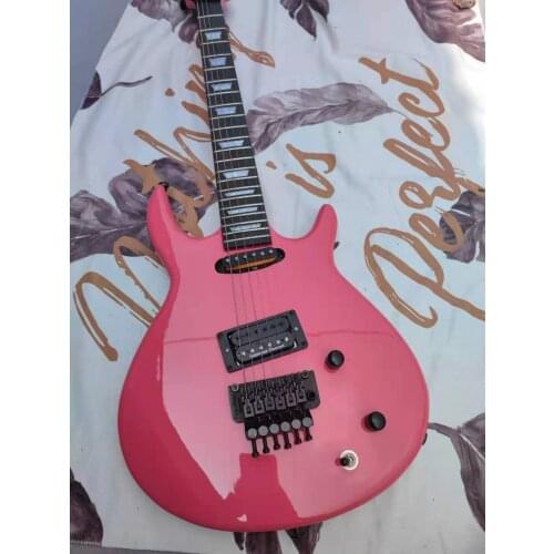 Pink Retro six string electric guitar. We can customize any style of electric guitar and electric bass