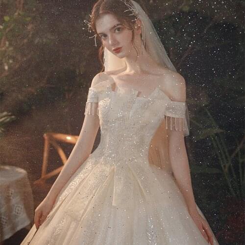 Vestido De Noiva 2021 Champagne Wedding Dress New Beadings Sexy Tulle Ball Gown Bride Dress Elegant Wedding Gowns