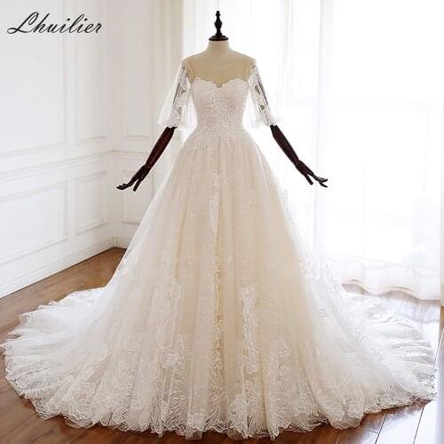 Lhuilier Scoop Neck A-line Lace Wedding Dresses 2020 Half Sleeves Corset Back Sequined Bridal Dress with Chapel Train