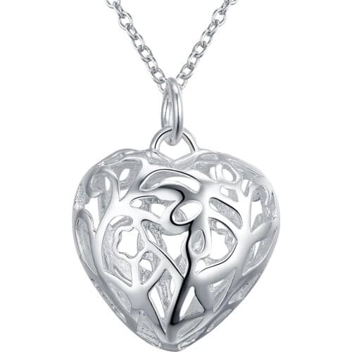 P010 Promotions Free shipping Beautiful fashion Elegant silver color charm HEART hollow retro pretty Girl Necklace jewelry