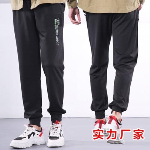 New mens loose and fashionable leisure sports stretch pants in spring and summer of 2021