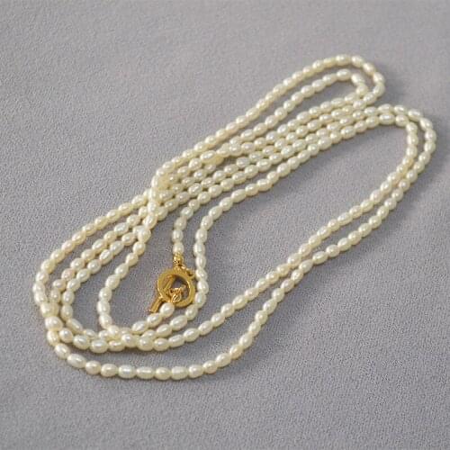 French fresh water rice pearl gentle little woman gentle temperament simple ot button fold sweater chain Long Necklace