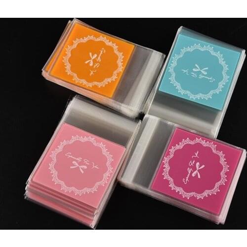 Hot sale 100pcs/bag Plastic Candy Pack paper OPP package bag Lovely Pink or Blue Bow Design Cake gift Packages