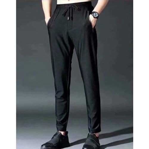 2020 New Summer Mens Pants Fashion Streetwear Ice silk mesh elasticity Trousers Casual jogging Fitness Sports Men Clothing Pant