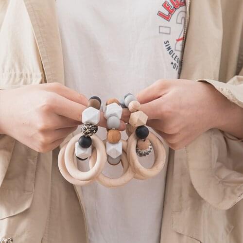 1PC Baby Toys Wooden Rattle Ring Teething Nursing Bracelets BPA Free Silicone Bead Music Rattle Hanger Newborn Educational Toys