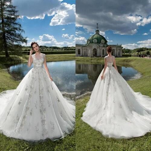 2020 Wedding Dresses Jewel Capped Sleeves Lace Appliques Bridal Gowns Custom Made Button Back Sweep Train A Line Wedding Dress