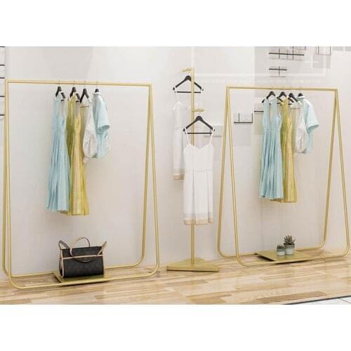The new clothes store display rack is a floor-to-ceiling womens clothing rack