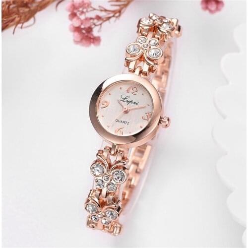 Luxury woman watch Fashion crystal Popular Ladies Casual Quartz Watch Stainless Steel Strap Watch femmes montres à quartz W1